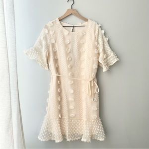 MALENY EMBELLISHED FLUTED HEM DRESS BEIGE